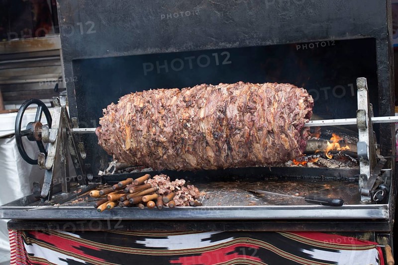 Turkish cag Kebab on pole in horizontal position