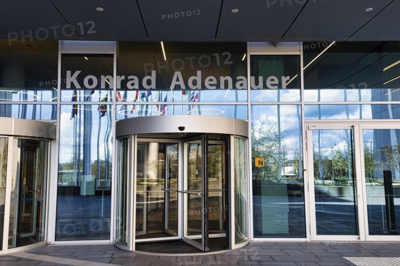 Entrance with revolving door and lettering