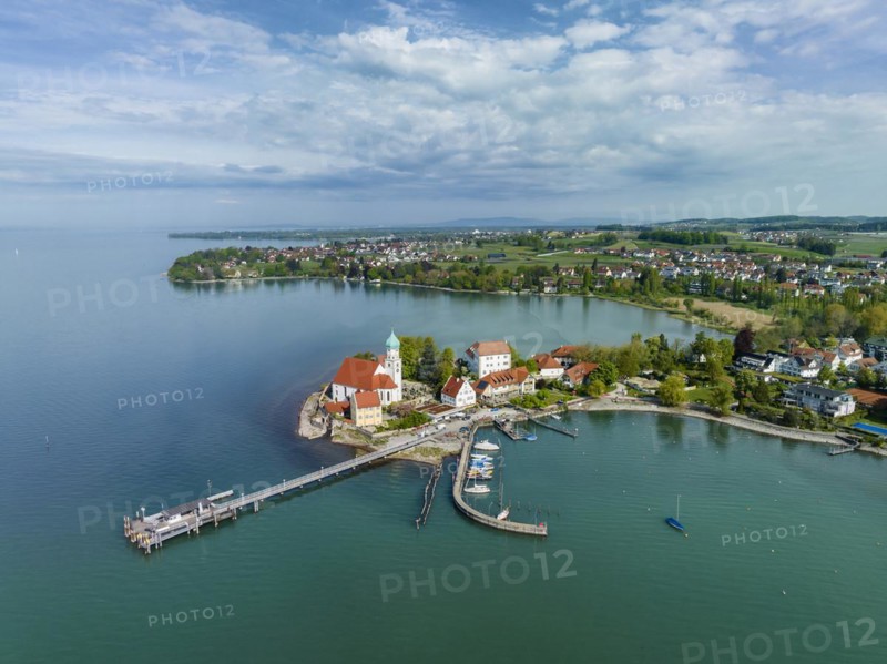 Aerial view of the moated castle peninsula on Lake Constance with the baroque church of St. George