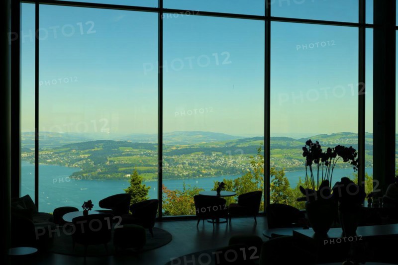 Hotel Five Stars Buergenstock with Restaurant over Lake Lucerne and Mountain in Sunny Day in Buergenstock