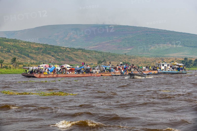 Overloaded riverboat on the Congo river