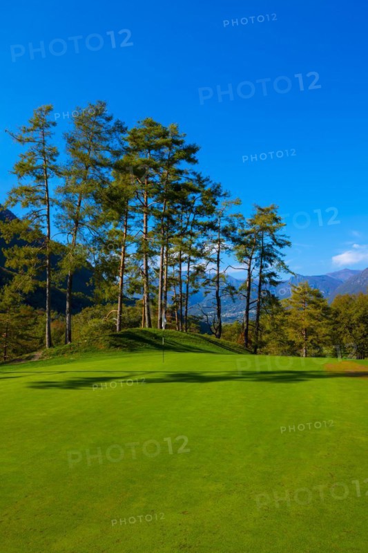Putting Green on Golf Course Menaggio with Mountain View in Autumn in Lombardy