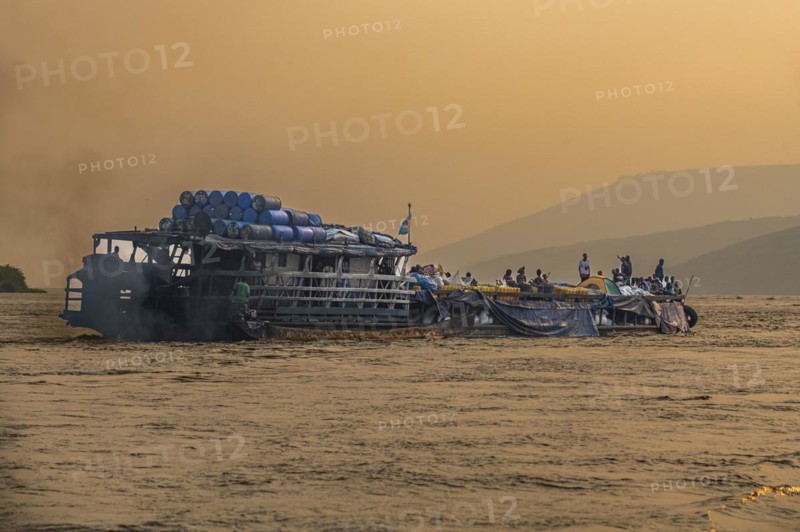 Overloaded riverboat on the Congo river