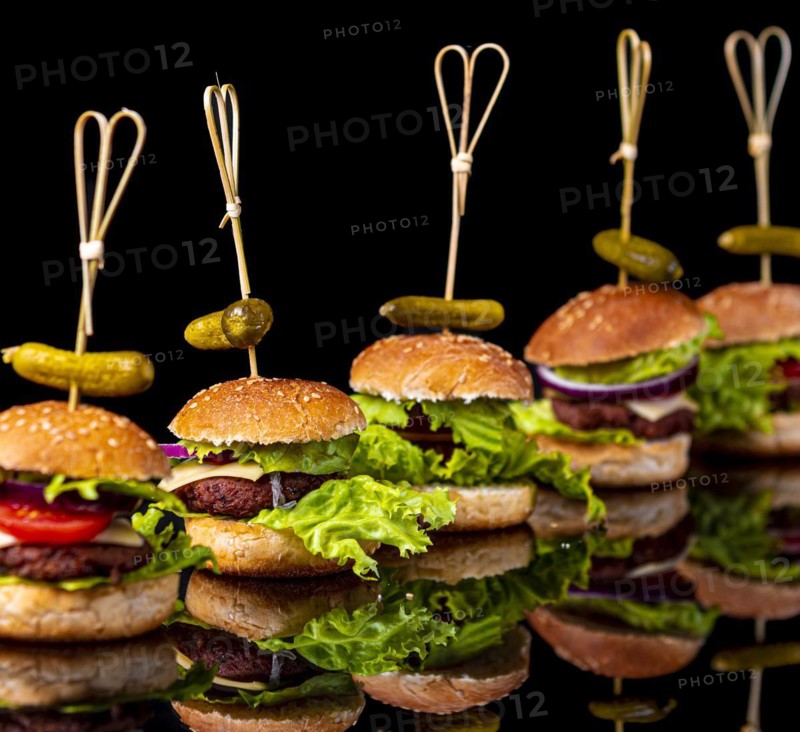 Small vegetarian hamburgers in a row