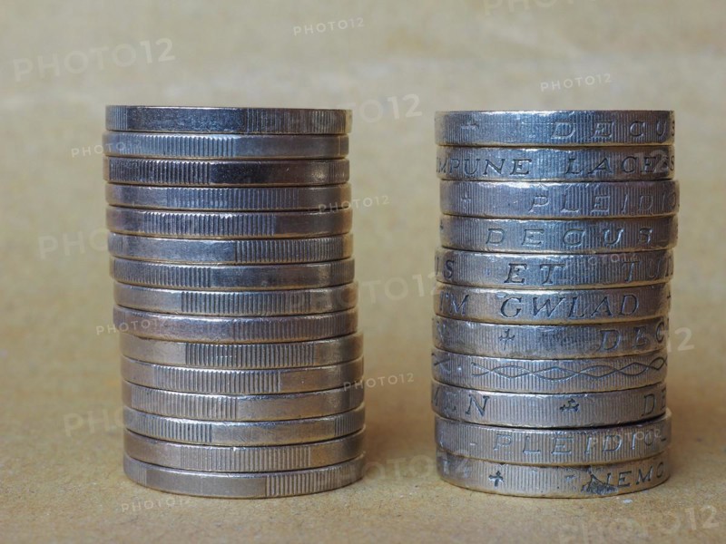 Euro and Pound coins pile