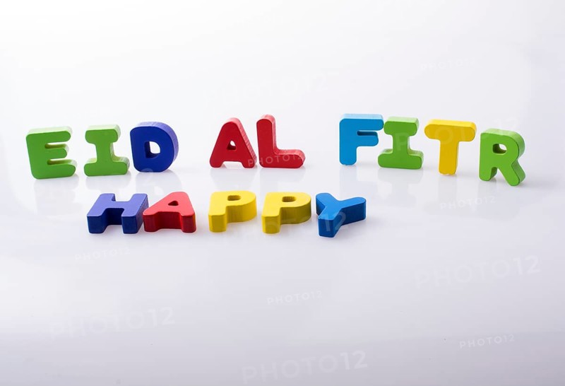 The word EID EL FITR written with colorful letter blocks
