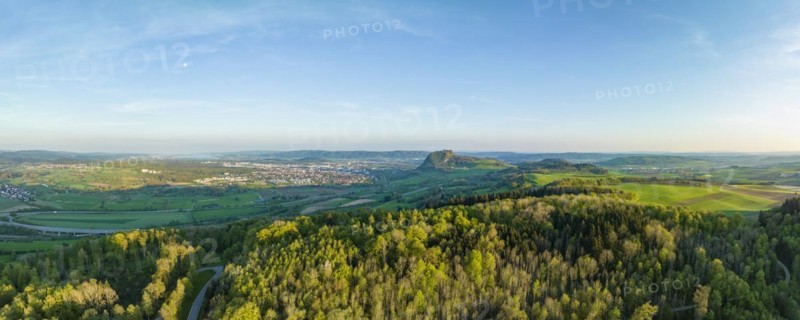 Aerial panorama of the volcanic Hegau landscape with Hohentwiel and the town of Singen am Hohentwiel