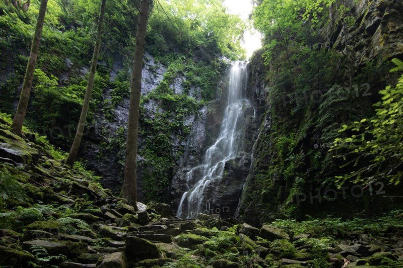 Landscape shot of the Burgbach waterfall