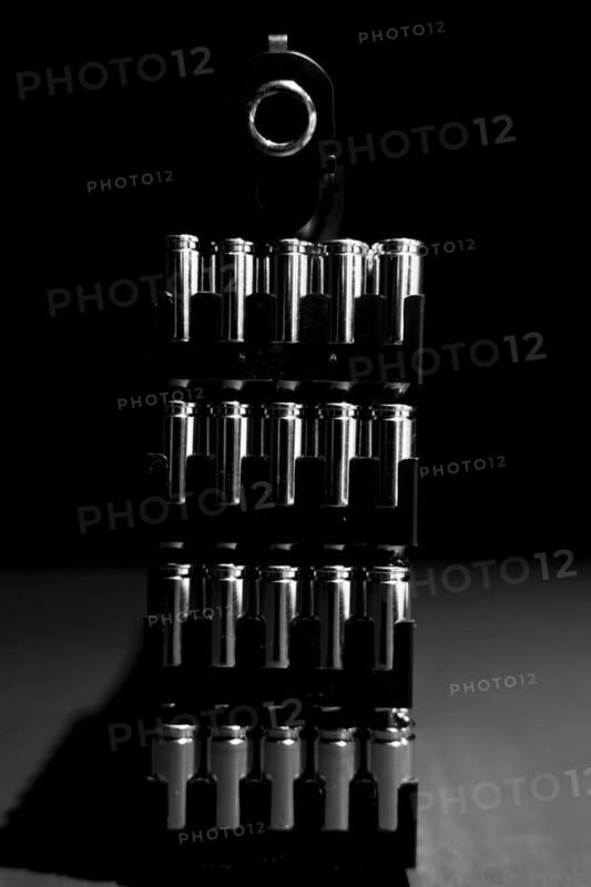 Elegant Semiautomatic 9mm Handgun Leaning on Bullet Ammunition in Switzerland