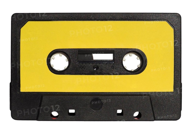 Magnetic tape cassette isolated over white