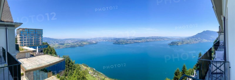Panoramic View from Hotel Balcony with Mountain View in a Sunny Summer Day in Burgenstock