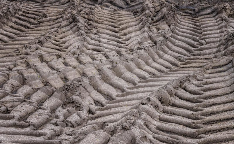 Tyre tracks of a tractor in loamy soil