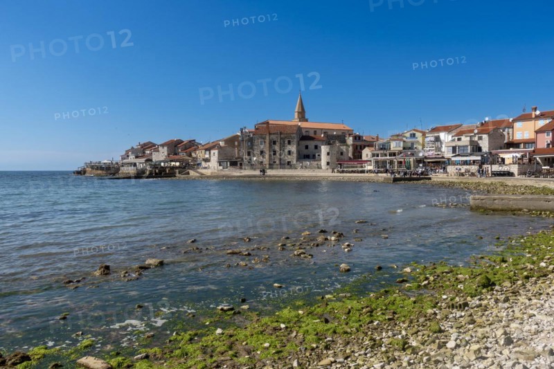 Beach and city view of the coastal town of Umag
