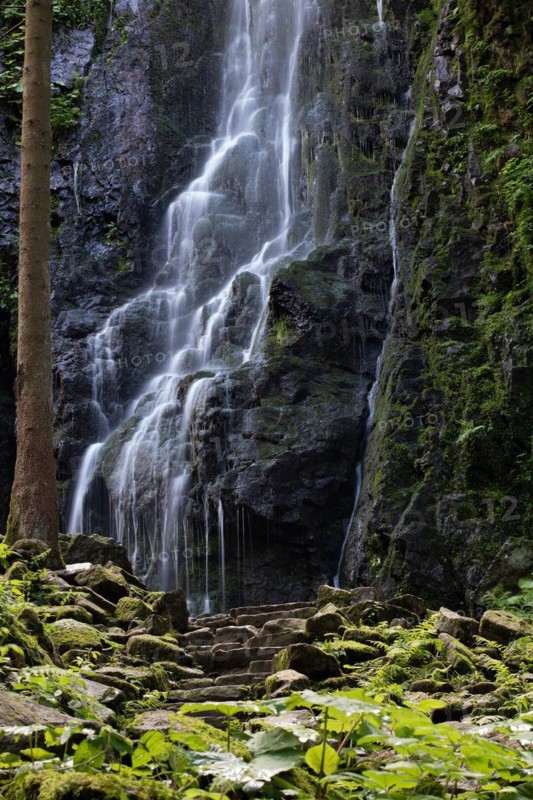 Landscape shot of the Burgbach waterfall