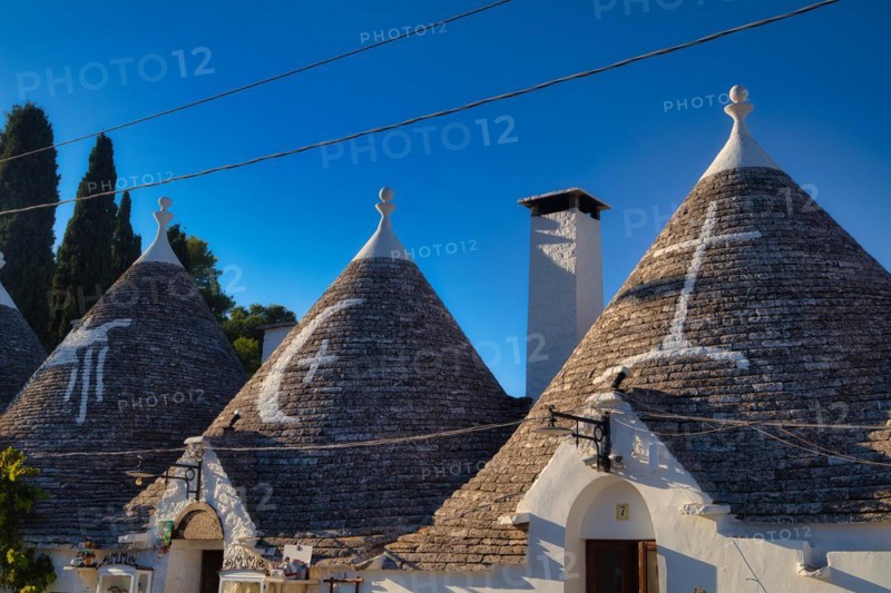 Trulli with symbols on the roof