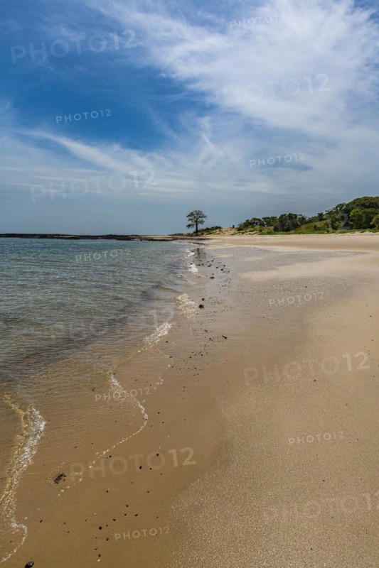 Long sandy beach on a little islet in Marinho Joao Vieira e Poilao National Park