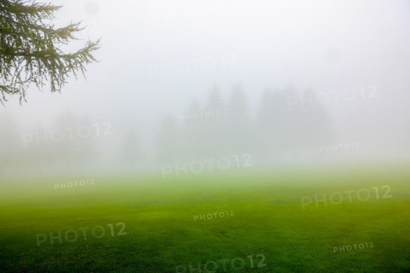 Crans Sur Sierre Golf Course with Fog in Crans Montana in Valais