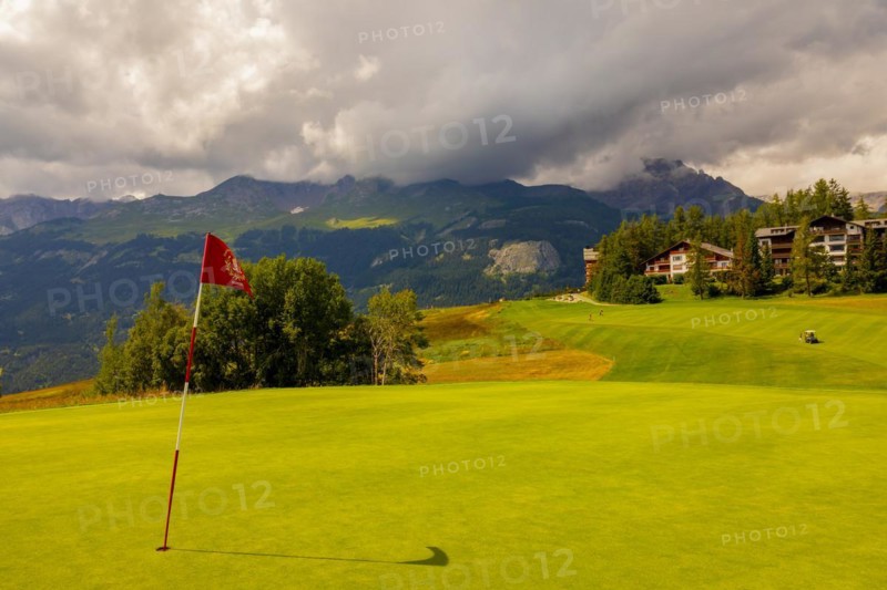 Crans Sur Sierre Golf Course with Hole 7 and Mountain View in Crans Montana in Valais