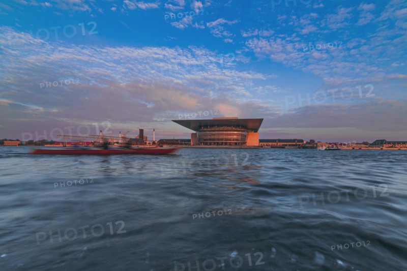 Water canal with opera house in background