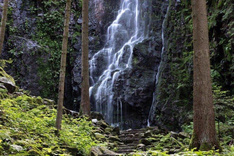 Landscape shot of the Burgbach waterfall