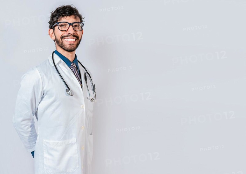 Portrait of happy doctor on isolated background. Happy latin doctor with copy space isolated