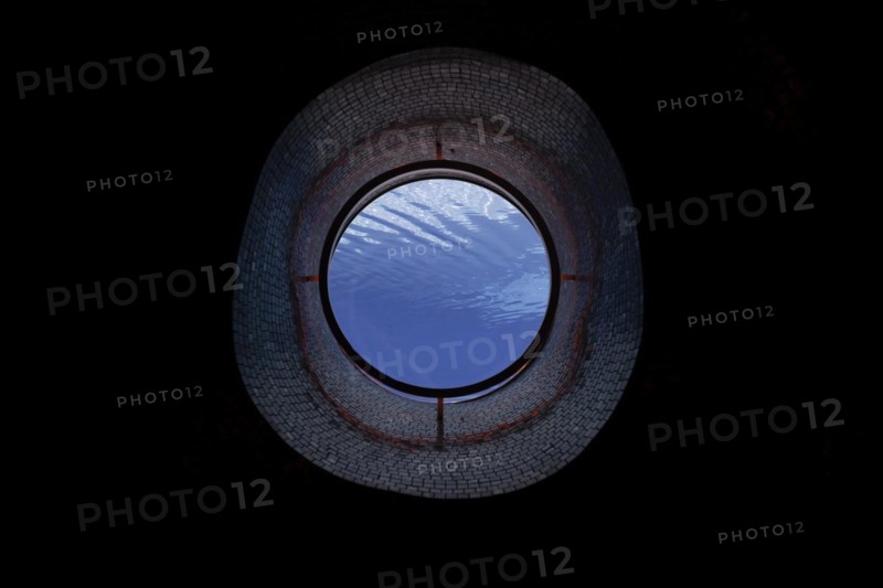 Ship Porthole in Underwater in Swimming Pool in a Sunny Day in Switzerland