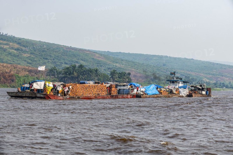 Overloaded riverboat on the Congo river