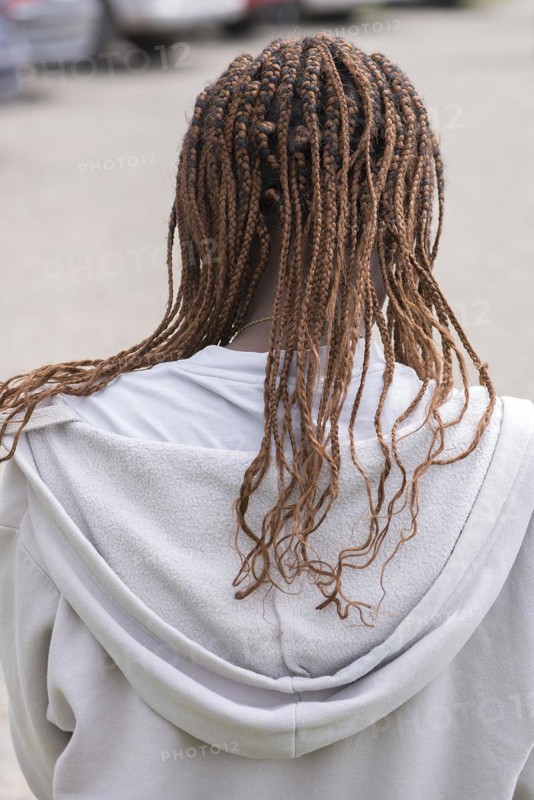 Woman with braided pigtails