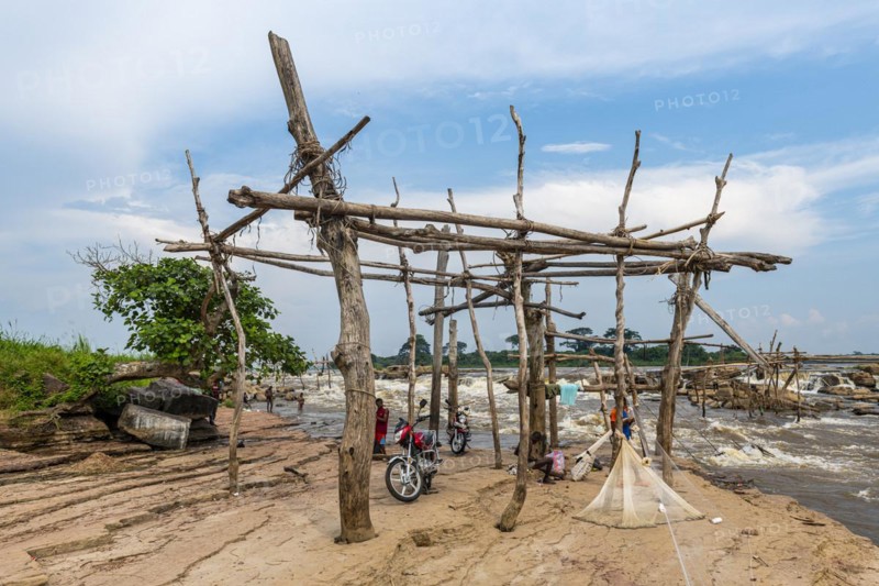 Wooden tripods with baskets attached
