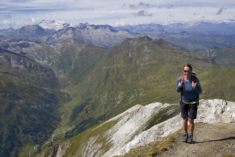 Woman on the summit of the Weisseck