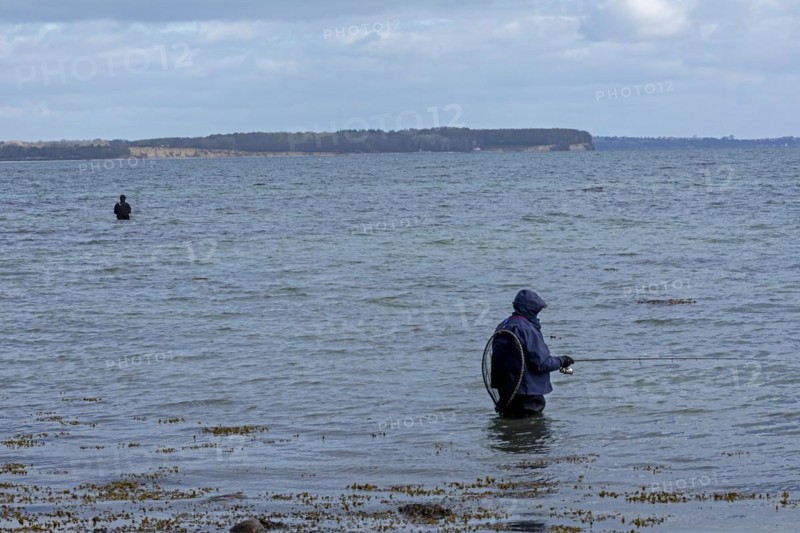 Anglers standing in the water