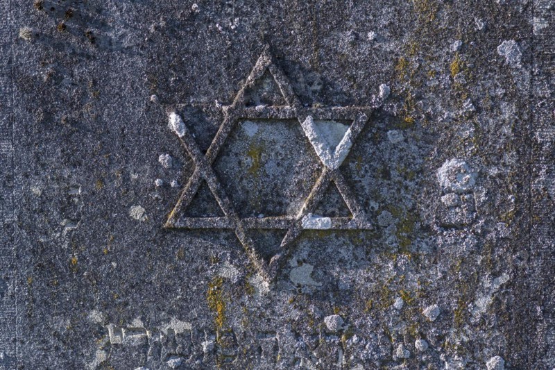 Jewish star on an old gravestone