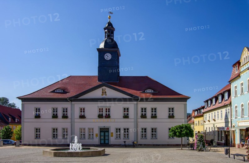 Urban scene in front of the historic town hall at the market