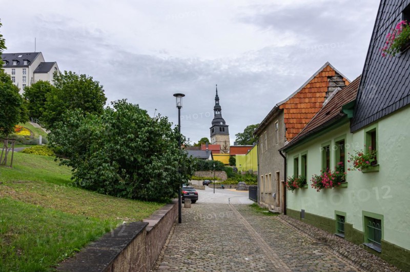 Street view in the upper town with a view to the 56 m high tower of the Oberkirche