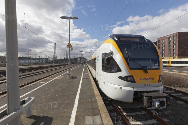 Eurobahn low-floor train stands at an empty platform