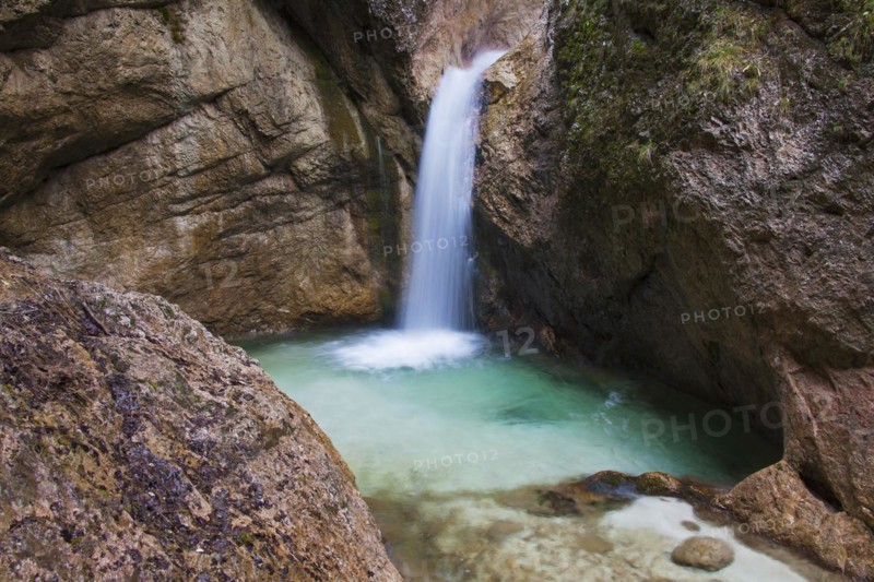 Waterfall in the river Almbach running through the Almbachklamm canyon in the Berchtesgaden Alps