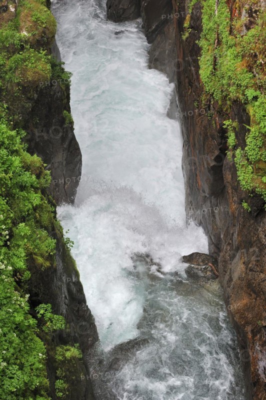 Waterfall running through narrow gorge at the Pont d'Espagne in the Hautes-Pyrenees near Cauterets