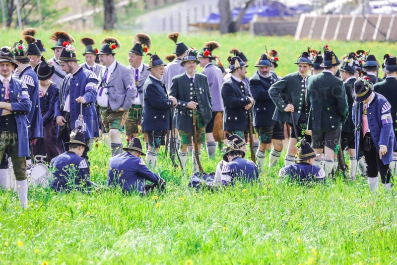 Mountain riflemen gather at the patron saint's day in a meadow near Gmund am Tegernsee