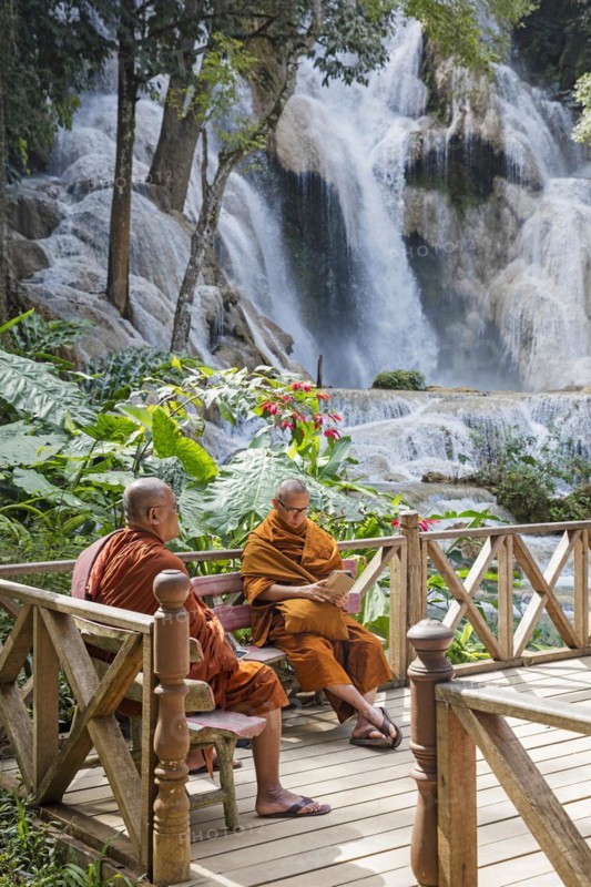 Two Buddhist monks at the Kuang Si Falls