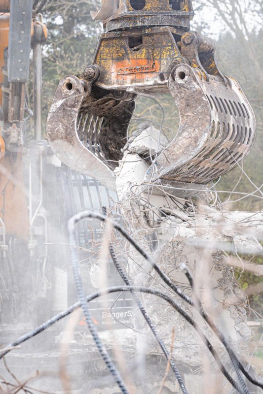 Excavator grab on demolition site