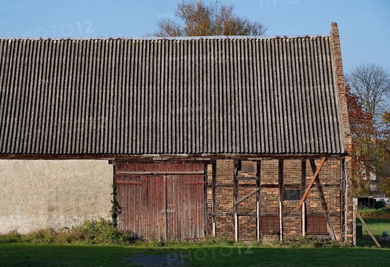 Still unrenovated historic barn in the barn district of Kremmen