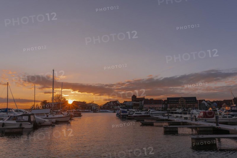City harbour of the small town Waren in the evening light