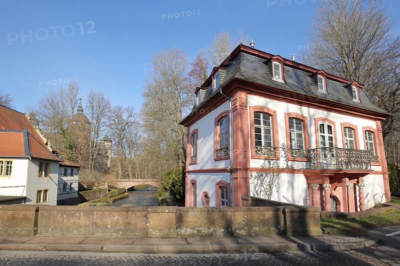 Building at Fuerstenau Castle with bridge over the Muemling stream