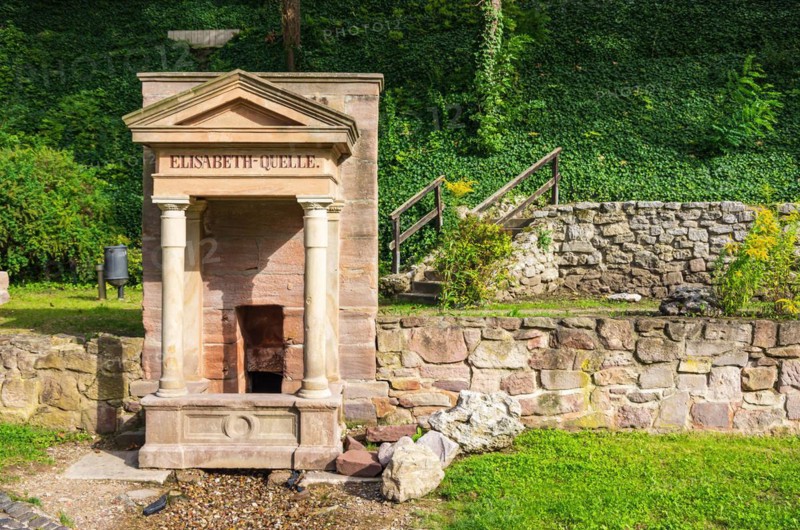 Fountain of the historic Elisabeth Spring in the spa gardens of Bad Frankenhausen