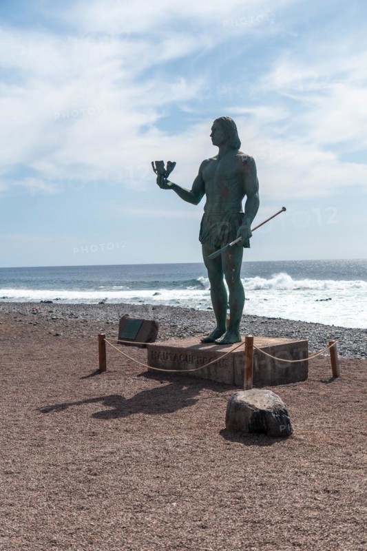 Statue of Hautacuperche on the beach of the town of Valle Gran Rey in La Gomera