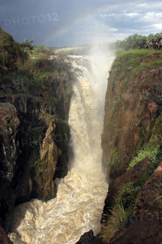 Rainbow above the Kunene river and the Epupa falls
