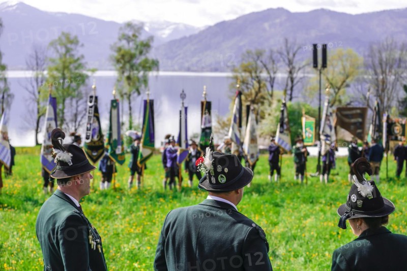 Mountain riflemen gather at the patron saint's day in a meadow near Gmund am Tegernsee