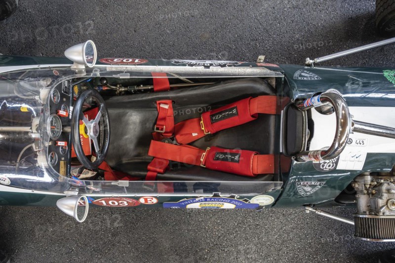 Top view of a retro racing car with bucket seat
