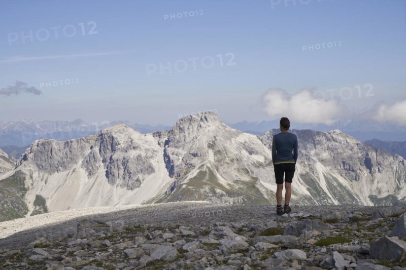Woman on the summit of the Weisseck