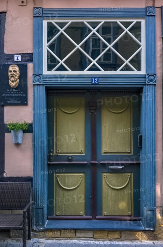 Historic front door with memorial plaque for Heinrich Conrad Huch